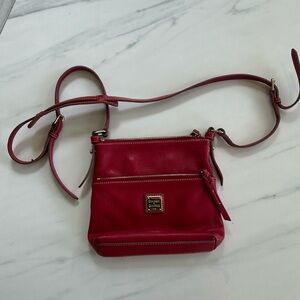 Red leather Dooney& Bourke crossbody bag.